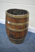 A VINTAGE OAK AND BRASS BANDED STICK BARREL, height 60cm (condition:-banding in need of tightening