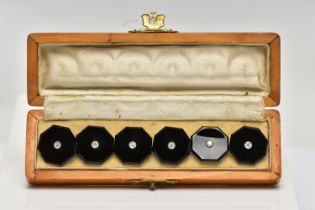 A CASED SET OF SIX MID 20TH CENTURY, ONYX AND DIAMOND DRESS STUDS, each highly polished onyx studs