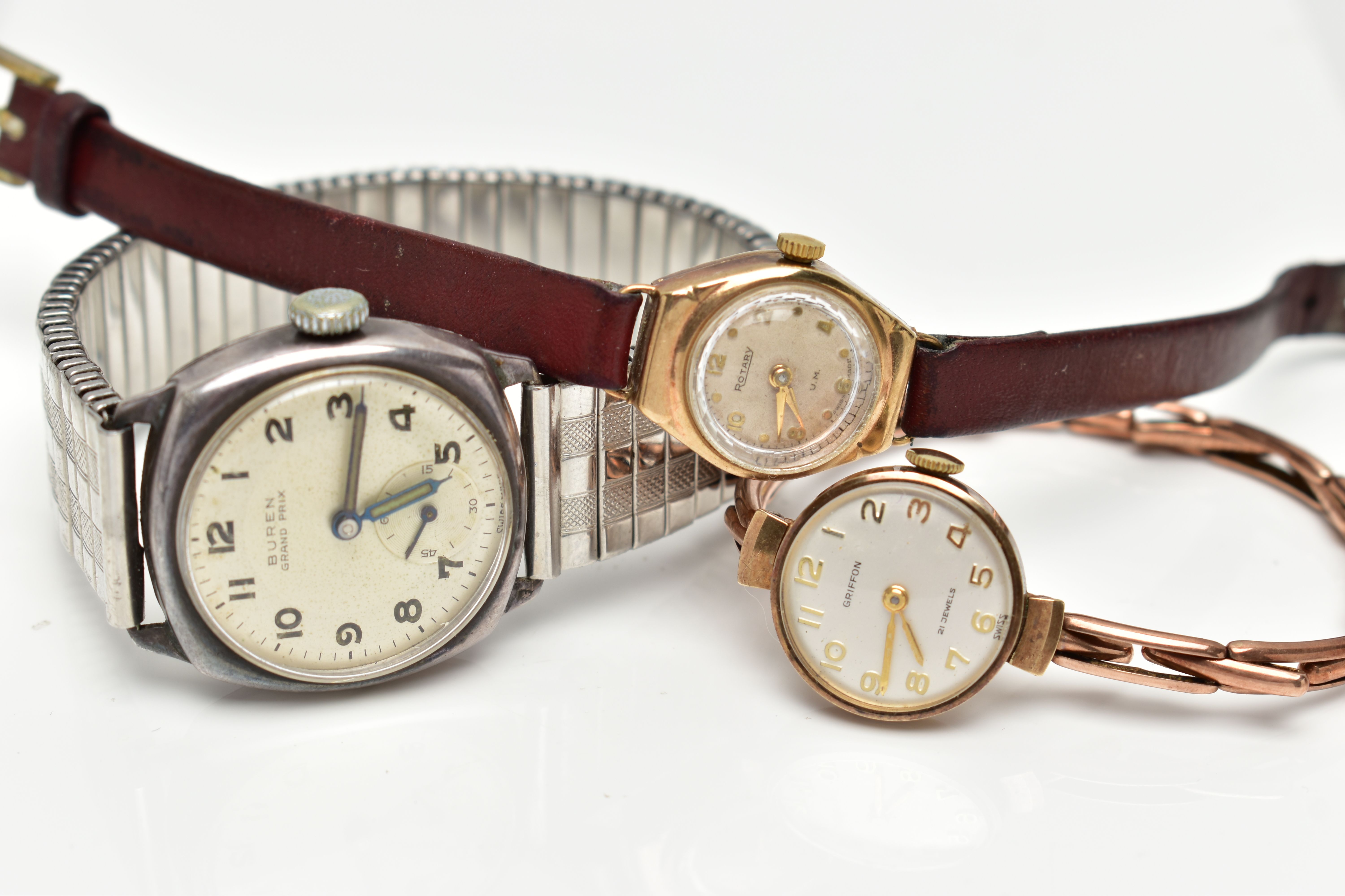 TWO LADY'S 9CT GOLD WRISTWATCHES AND A 'BUREN' WRISTWATCH, the first manual wind 'Griffon' watch,