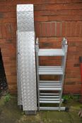 A SET OF MULTI PURPOSE FOLDING LADDERS along with a pair of aluminium ramps measuring 170cm length x