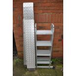 A SET OF MULTI PURPOSE FOLDING LADDERS along with a pair of aluminium ramps measuring 170cm length x