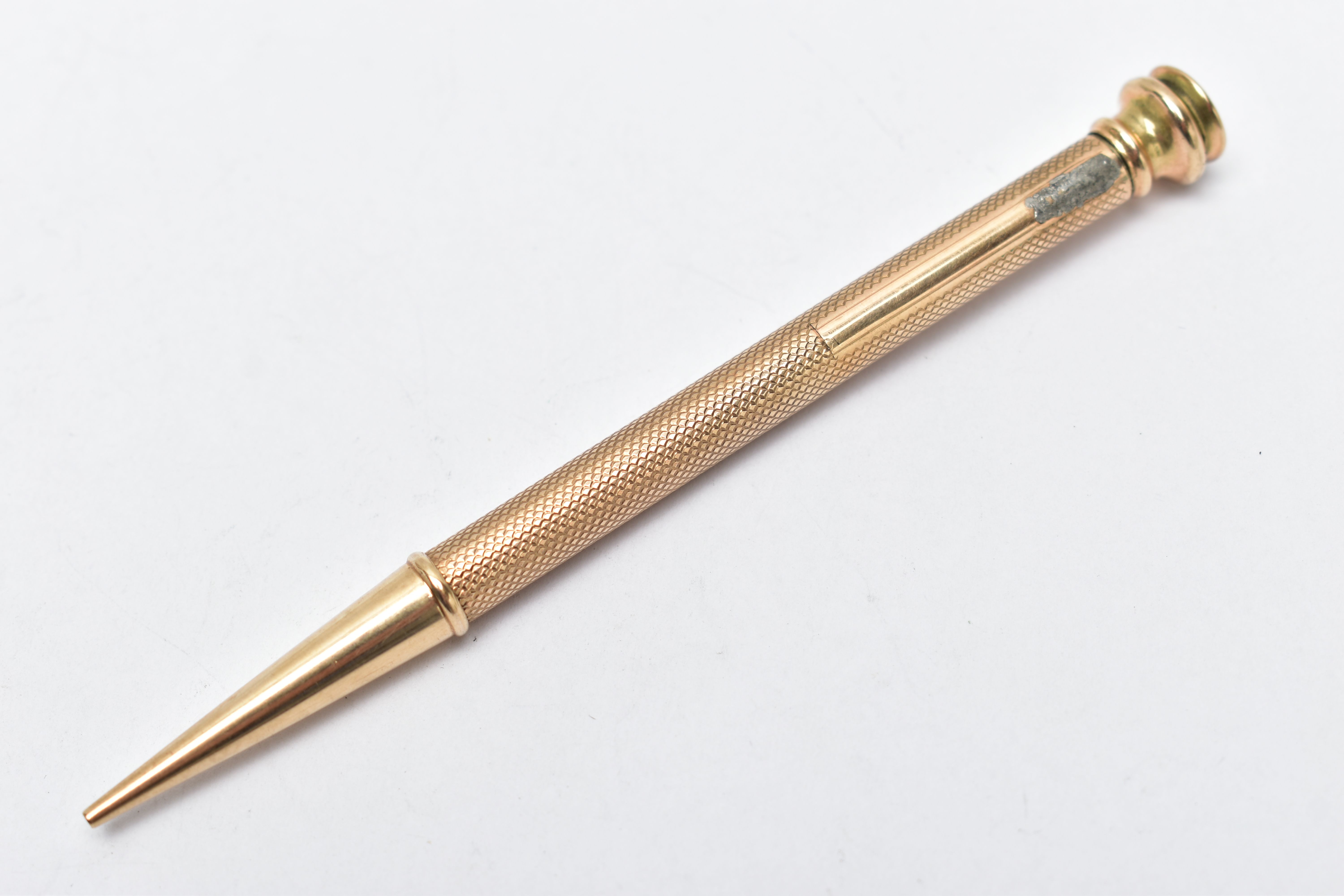 A YELLOW METAL PROPELLING PENCIL, engine turned pattern stamped '9ct gold', AF terminal, length - Image 2 of 4