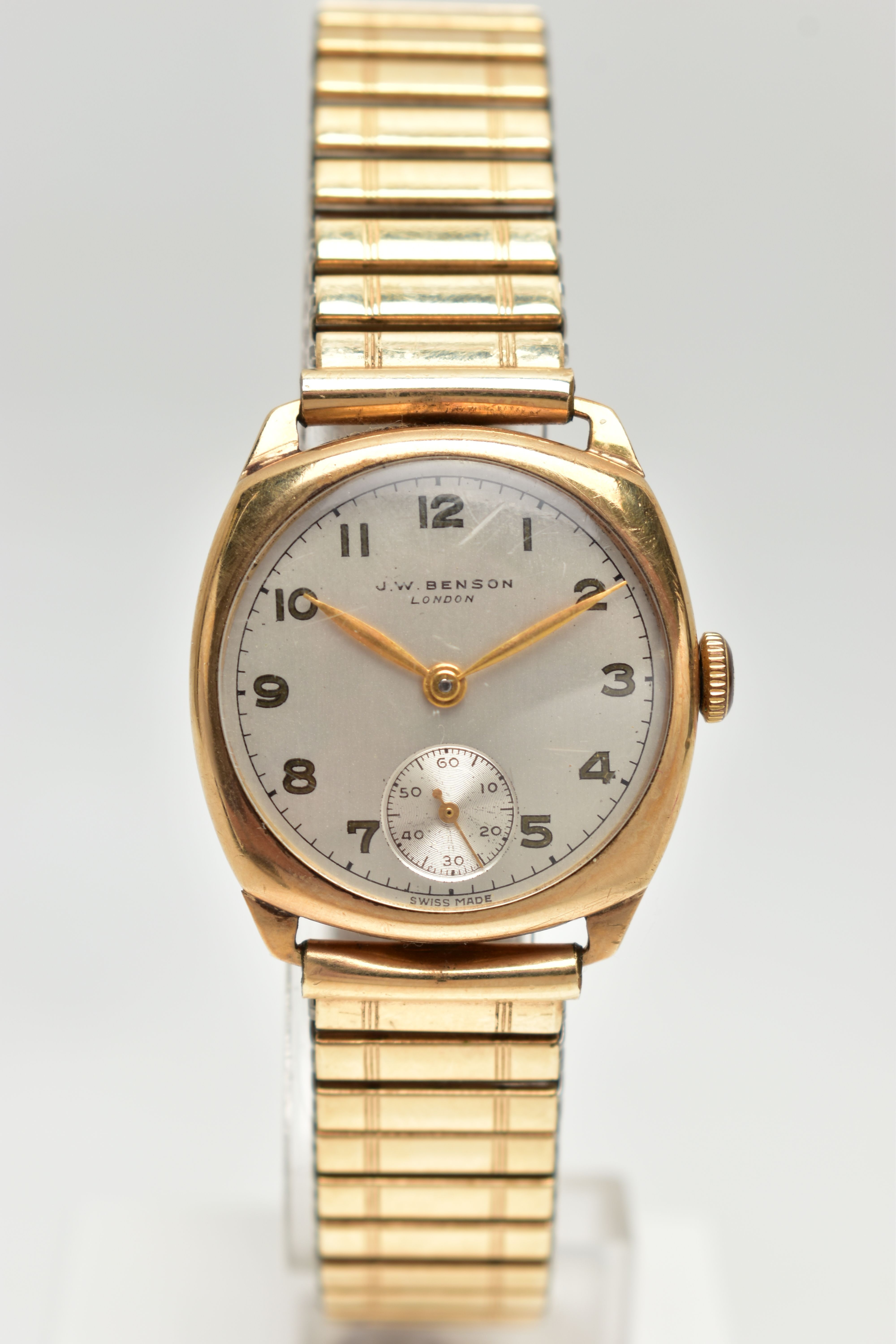 A 9CT GOLD 'J.W.BENSON' WRISTWATCH, manual wind, round silver dial signed 'J.W.Benson, London',