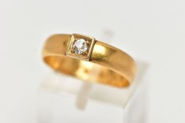 A MID VICTORIAN DIAMOND 22CT GOLD BAND RING, the old cut diamond within a four claw, square setting,