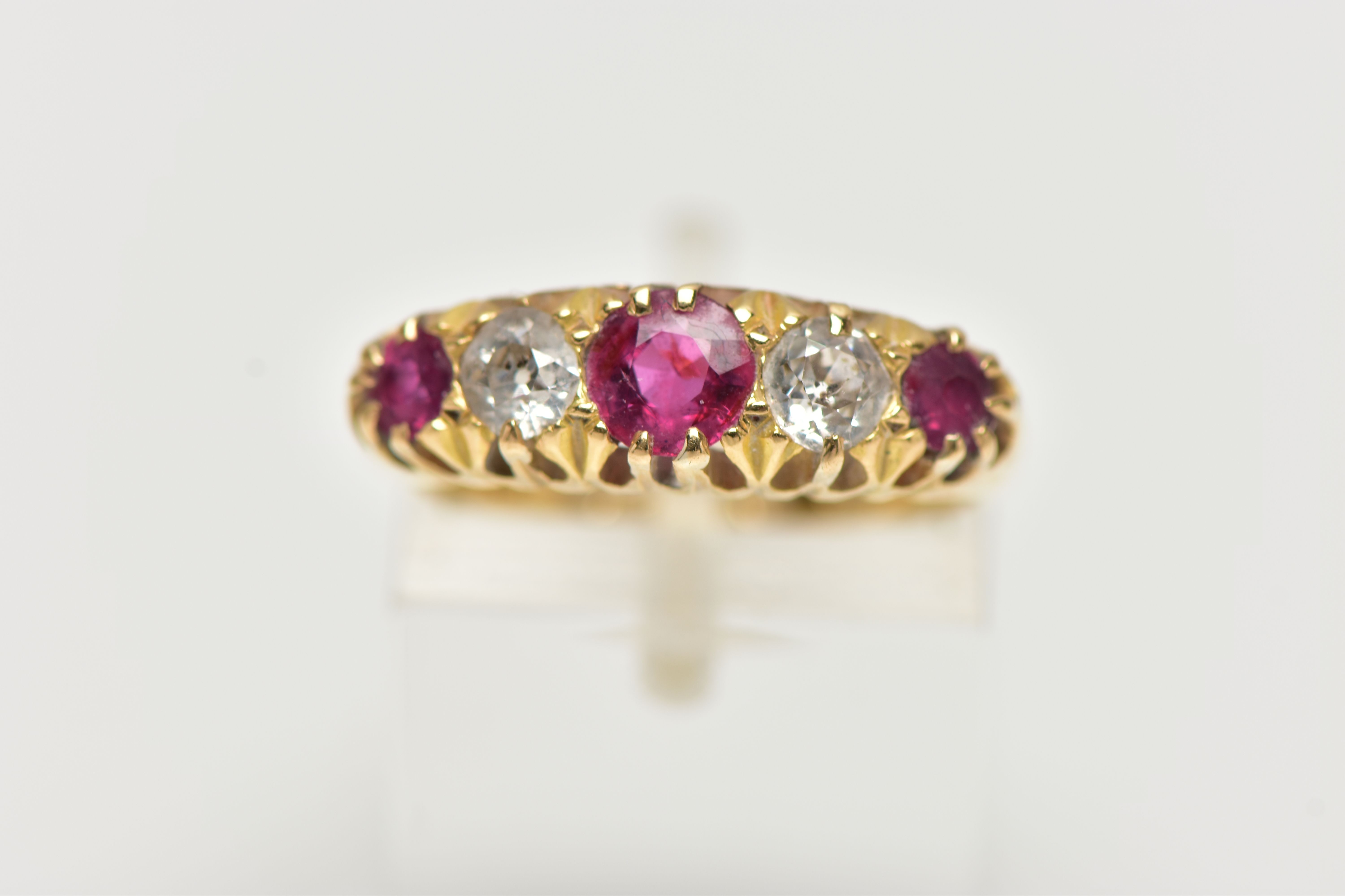 AN EARLY 20TH CENTURY 18CT GOLD, RUBY AND DIAMOND RING, designed with three circular cut rubies, - Image 5 of 5