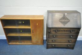 A 20TH CENTURY OAK FALL FRONT BUREAU, with a fitted interior, above four drawers, and a teak