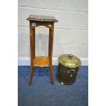 A CYLINDRICAL BRASS COAL BUCKET, with a lid, along with a mahogany plant stand (condition:-surface