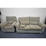 A BROWN UPHOLSTERED LOUNGE SUITE, comprising a two seater settee, length 193cm, and an armchair (