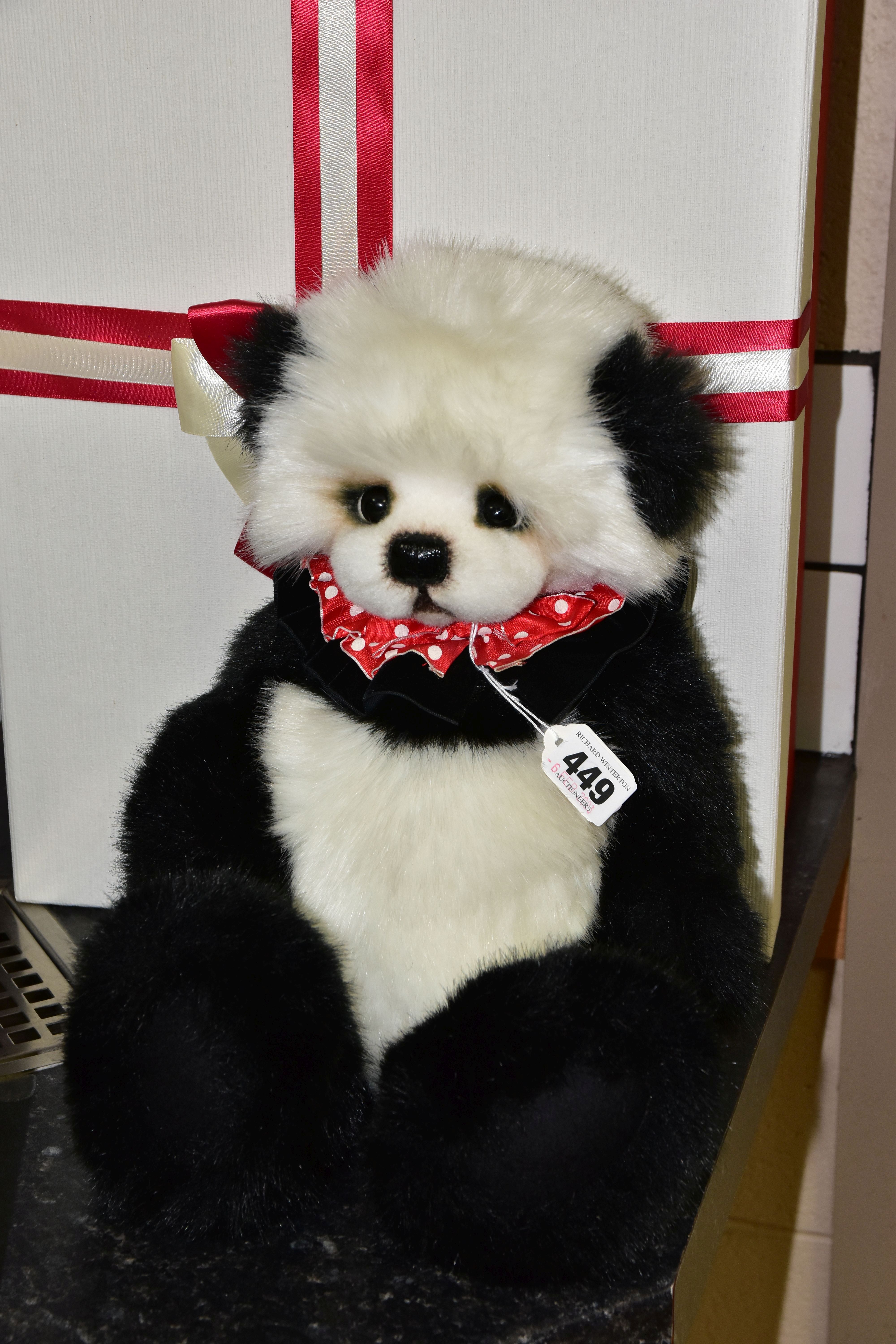 A BOXED 3 O'CLOCK BEARS TEDDY BEAR, in the form of a panda, fully jointed with shaved muzzle,