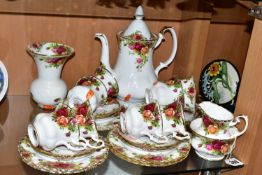 A ROYAL ALBERT 'OLD COUNTRY ROSES' PATTERN COFFEE SET, comprising a coffee pot, six coffee cups, six