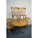 A CIRCULAR CHERRYWOOD PEDESTAL DINING TABLE, diameter 108cm x height 78cm, and four chairs (5)