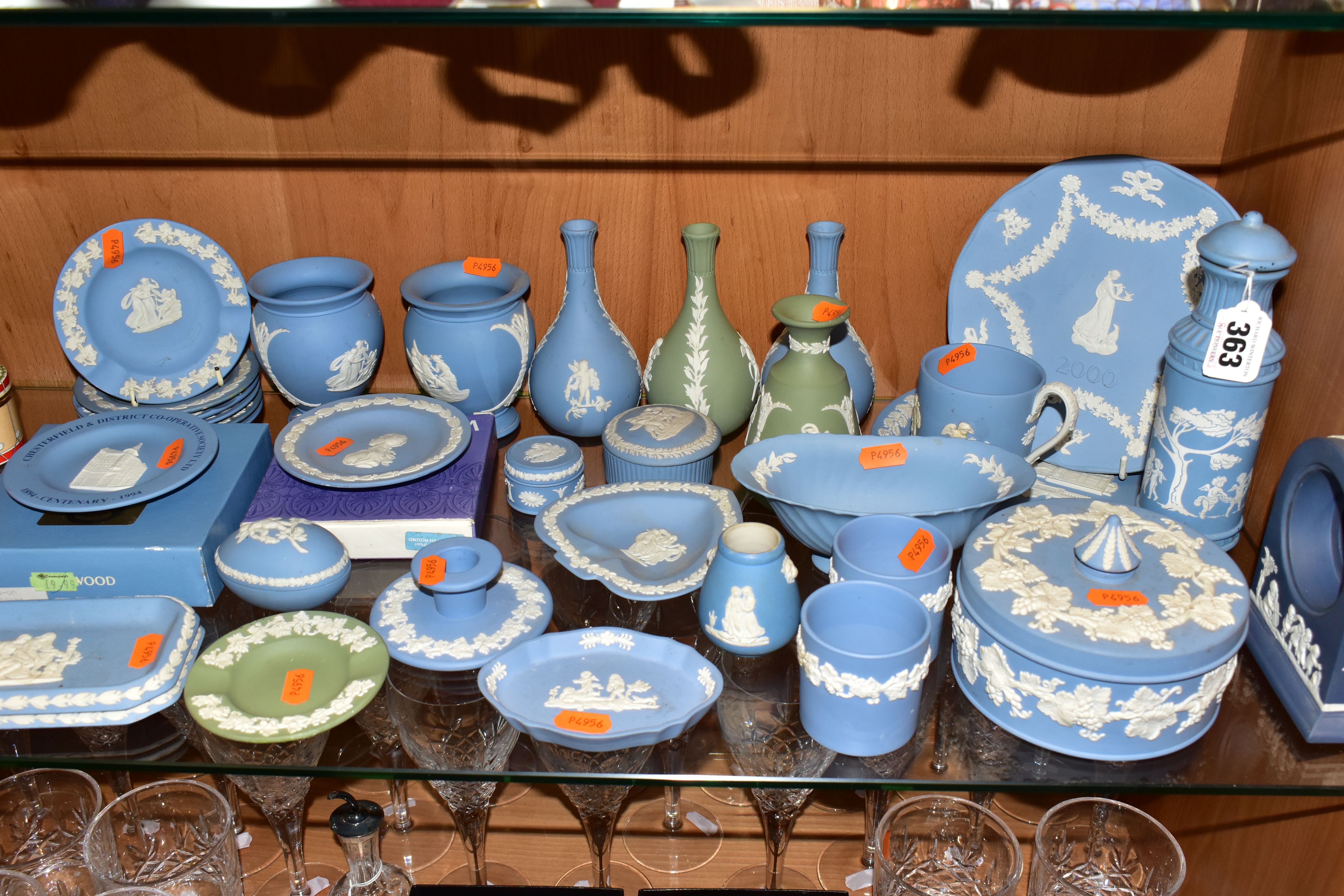 A COLLECTION OF WEDGWOOD JASPERWARES, mainly light blue pieces, to include six vases, tallest