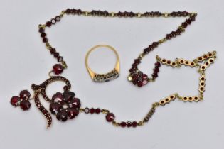 A YELLOW METAL DIAMOND AND SAPPHIRE FIVE STONE RING AND A GARNET NECKLACE, the ring designed with