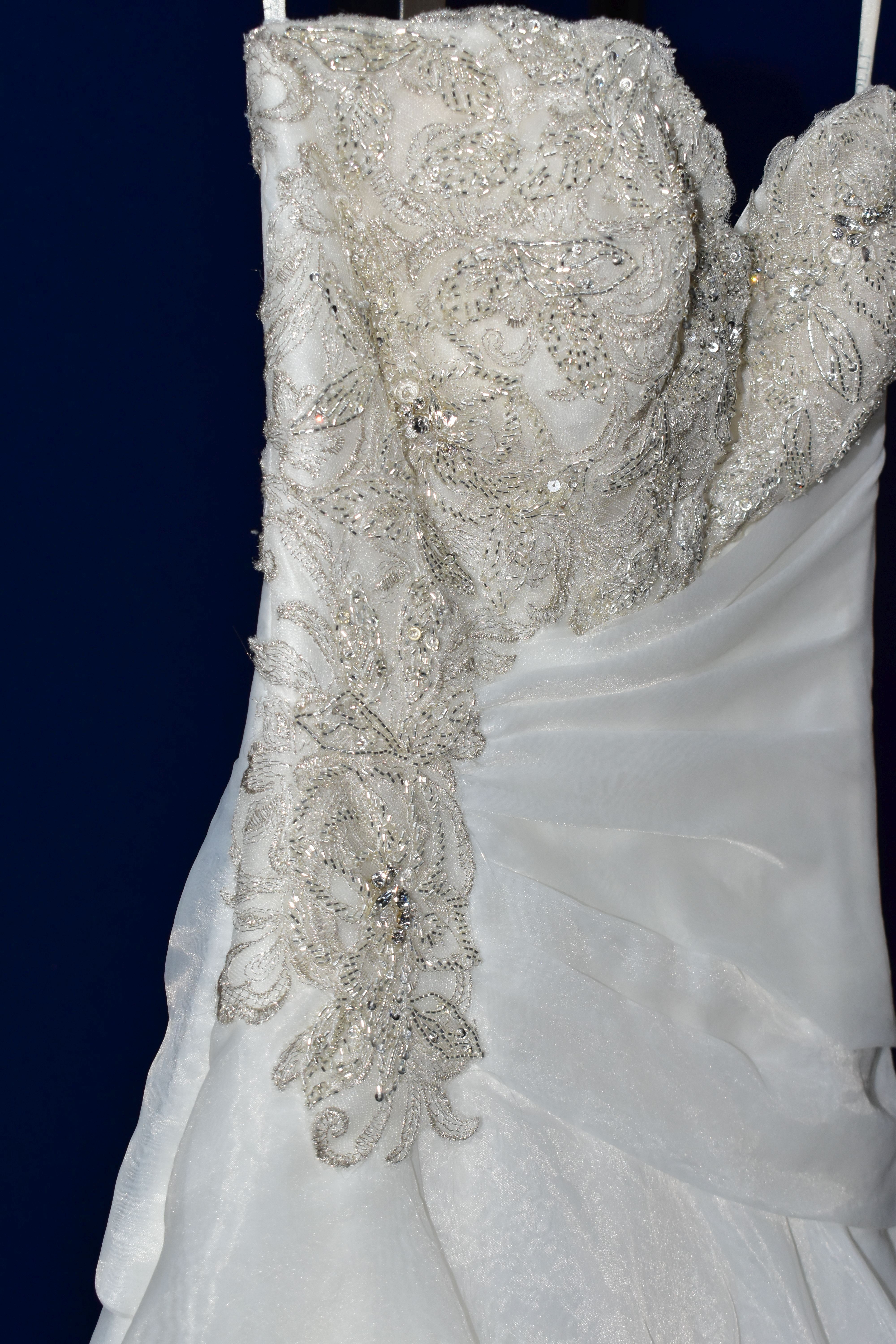 WEDDING DRESS, size 6, long train, pewter accent beaded appliques, strapping detail in the back, - Image 5 of 10