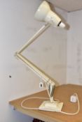 AN ANGLEPOISE LAMP, model 1227 produced 1938 - 1968, stepped base marked 'Made in England by Herbert