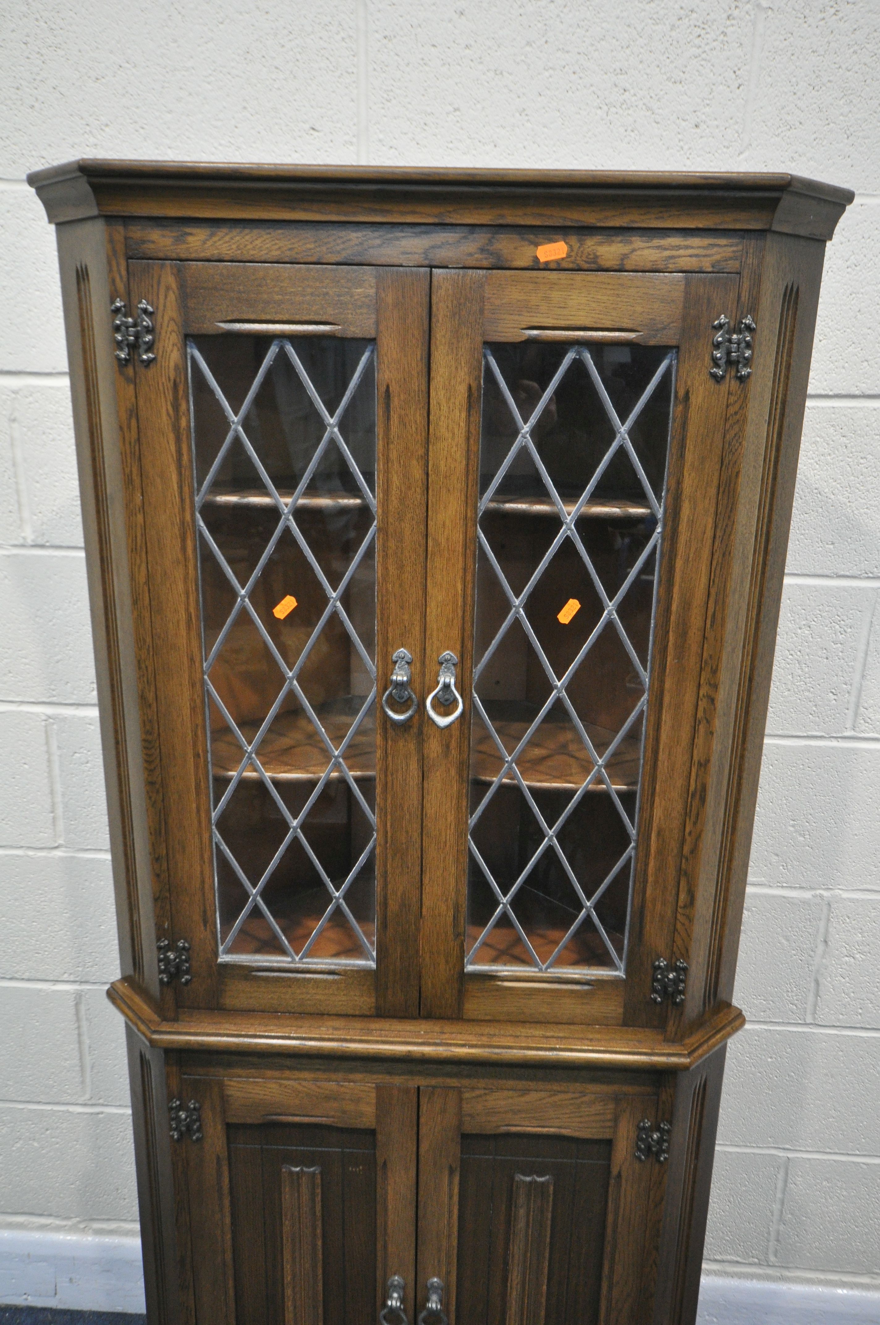 AN OLD CHARM OAK TWO DOOR LEAD GLAZED DISPLAY CABINET, with three glass shelves, width 61cm x - Image 4 of 5