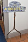 A VINTAGE TIN SHOP SIGN, cast iron stand with two prongs, 'Nelson Tipped Cigarettes' 'Trolleys