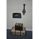 A VINTAGE CANVASS TRAVELINNG TRUNK, along with an modern hinged chest, a frameless wall mirror,