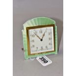 AN ART DECO SMITHS DESK CLOCK, in a shaped pale green guilloche enamel surround, the square dial