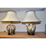 A PAIR OF MOORCROFT POTTERY 'WINDRUSH IRIS' TABLE LAMPS, of baluster form on wooden bases, decorated