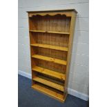 A MODERN PINE OPEN BOOKCASE, width 92cm x depth 30cm x height 183cm