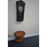 AN EARLY TO MID 20TH CENTURY OAK WALL CLOCK, with winding key and pendulum, along with a yew wood