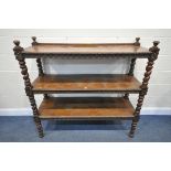 A LATE 19TH/EARLY 20TH CENTURY CARVED OAK THREE TIER BUFFET, on barley twist uprights, width 137cm x