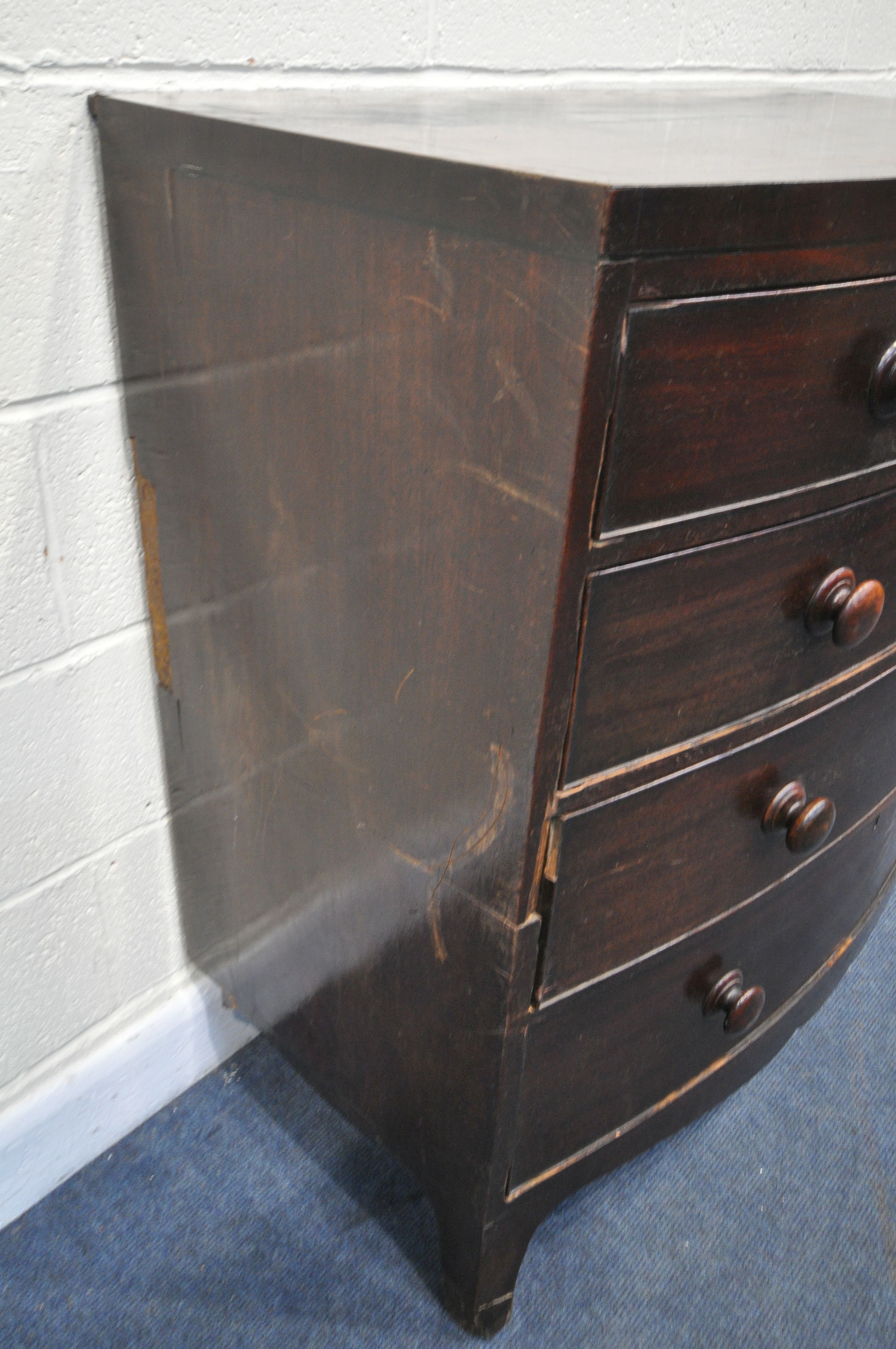 A GEORGIAN MAHOGANY BOWFRONT CHEST OF TWO SHORT OVER THREE LONG DRAWERS, with turned handles, on - Image 3 of 3