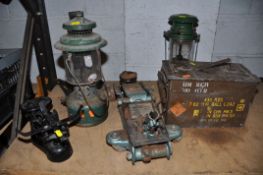 A VINTAGE MILITARY CASE ,along with two vintage paraffin lamps, a set of vintage black scales, a