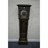 AN EARLY TO MID 20TH CENTURY OAK LONGCASE CLOCK, with a brass and silvered 9 inch dial, Roman