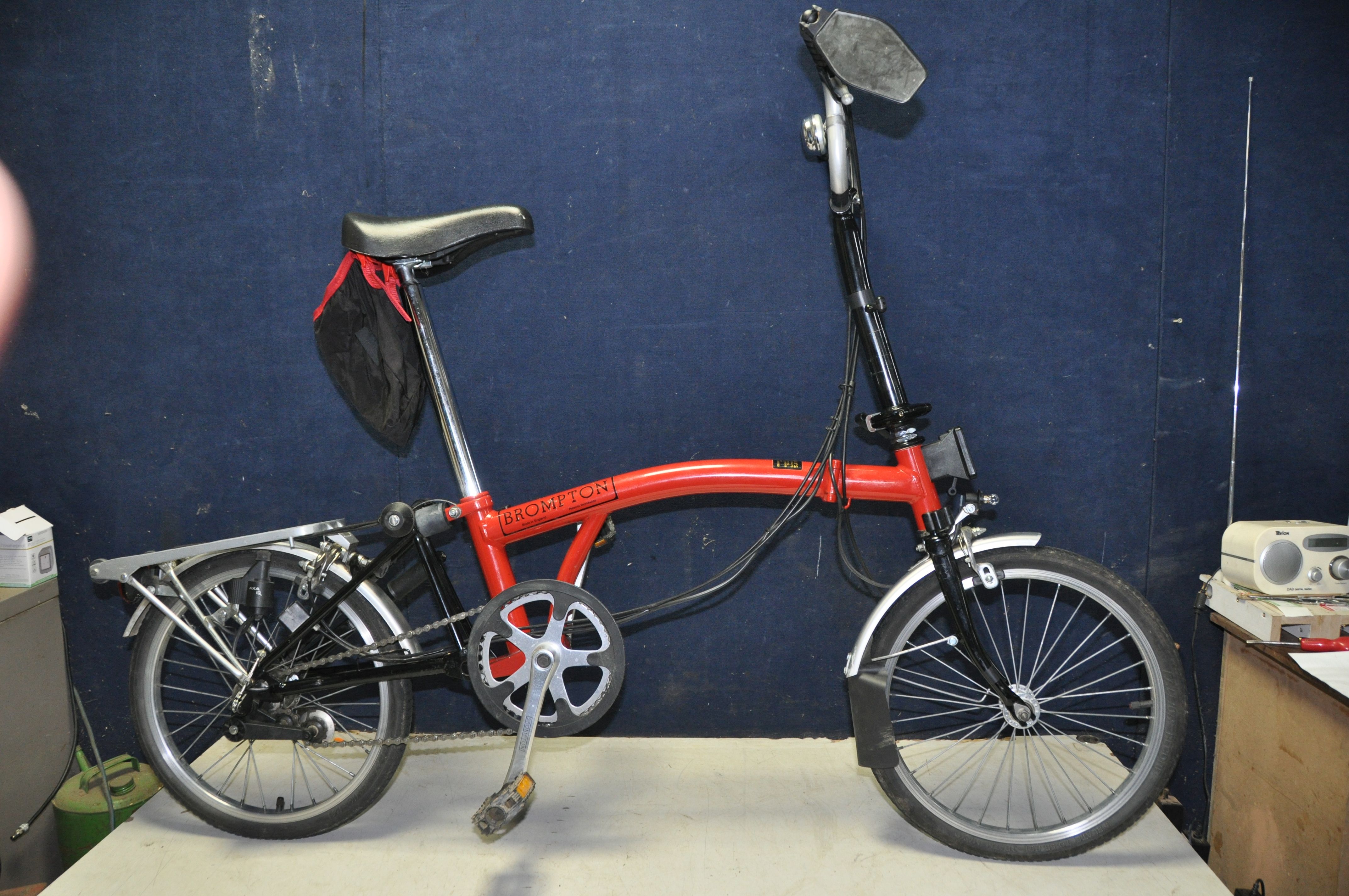 A BROMPTON FOLDING BIKE WITH BAG in red - Image 4 of 6