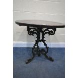 A VICTORIAN CAST IRON BISTRO TABLE, with a later mahogany top, with a circular plaque, inscribed