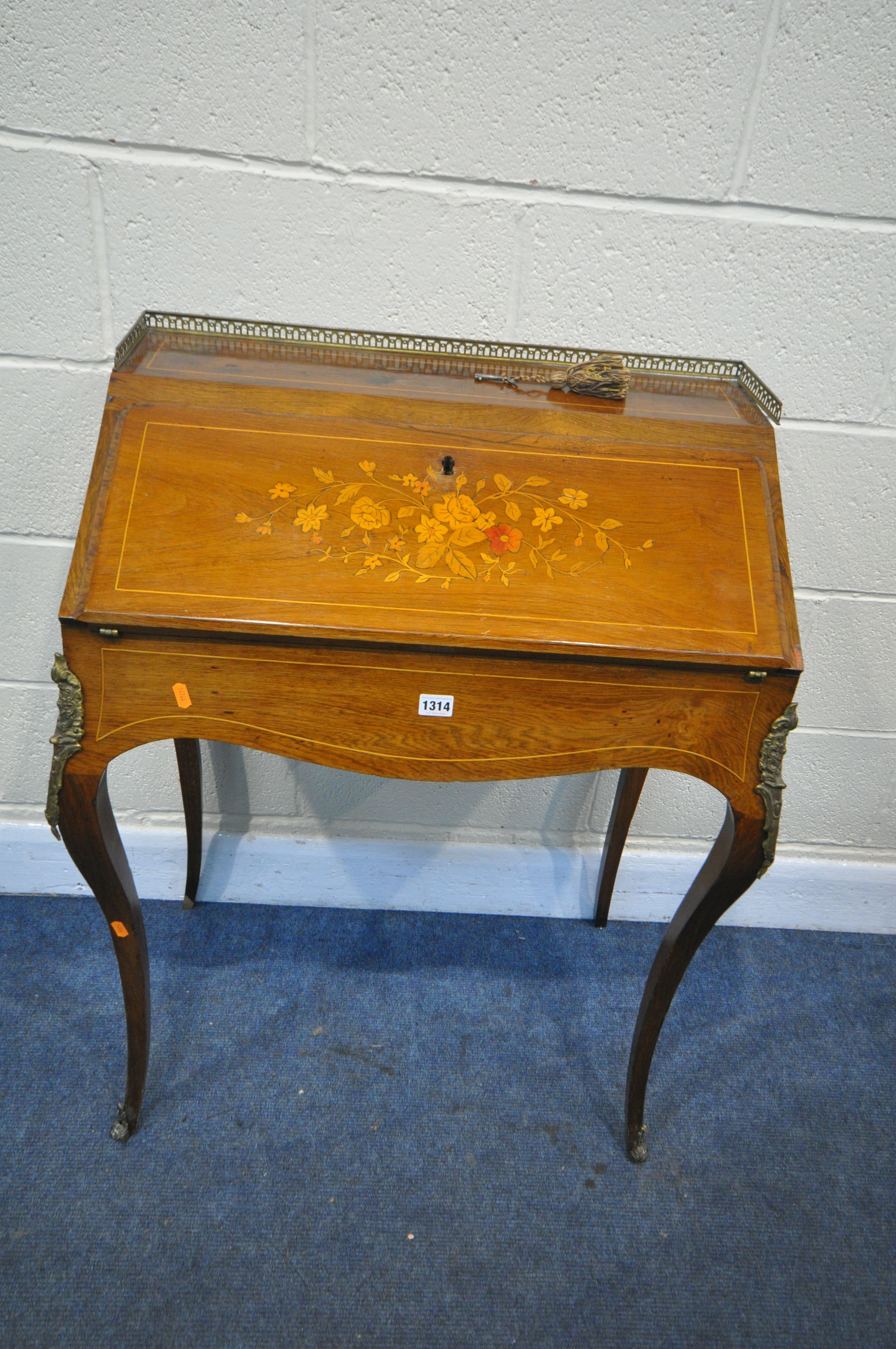 A LOUIS XVI STYLE KINGWOOD AND MARQUETRY INLAID BUREAU DE DAME, with a brass gallery, the fall front