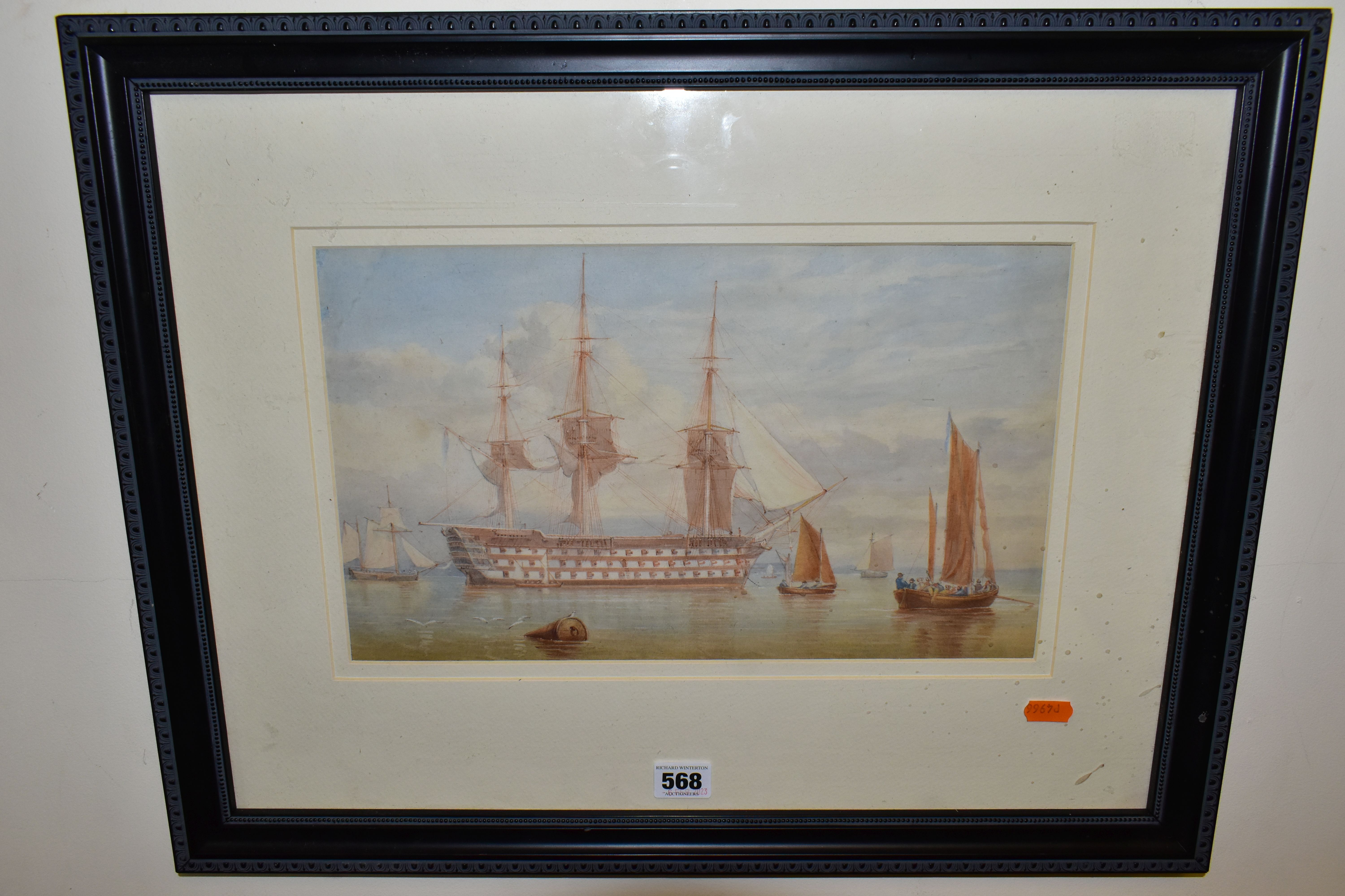 A 19TH CENTURY WATERCOLOUR DEPICTING A THREE DECK SHIP OF THE LINE, the ship is at anchor with