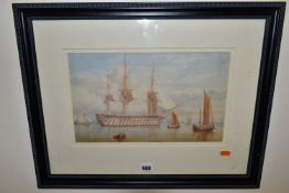 A 19TH CENTURY WATERCOLOUR DEPICTING A THREE DECK SHIP OF THE LINE, the ship is at anchor with