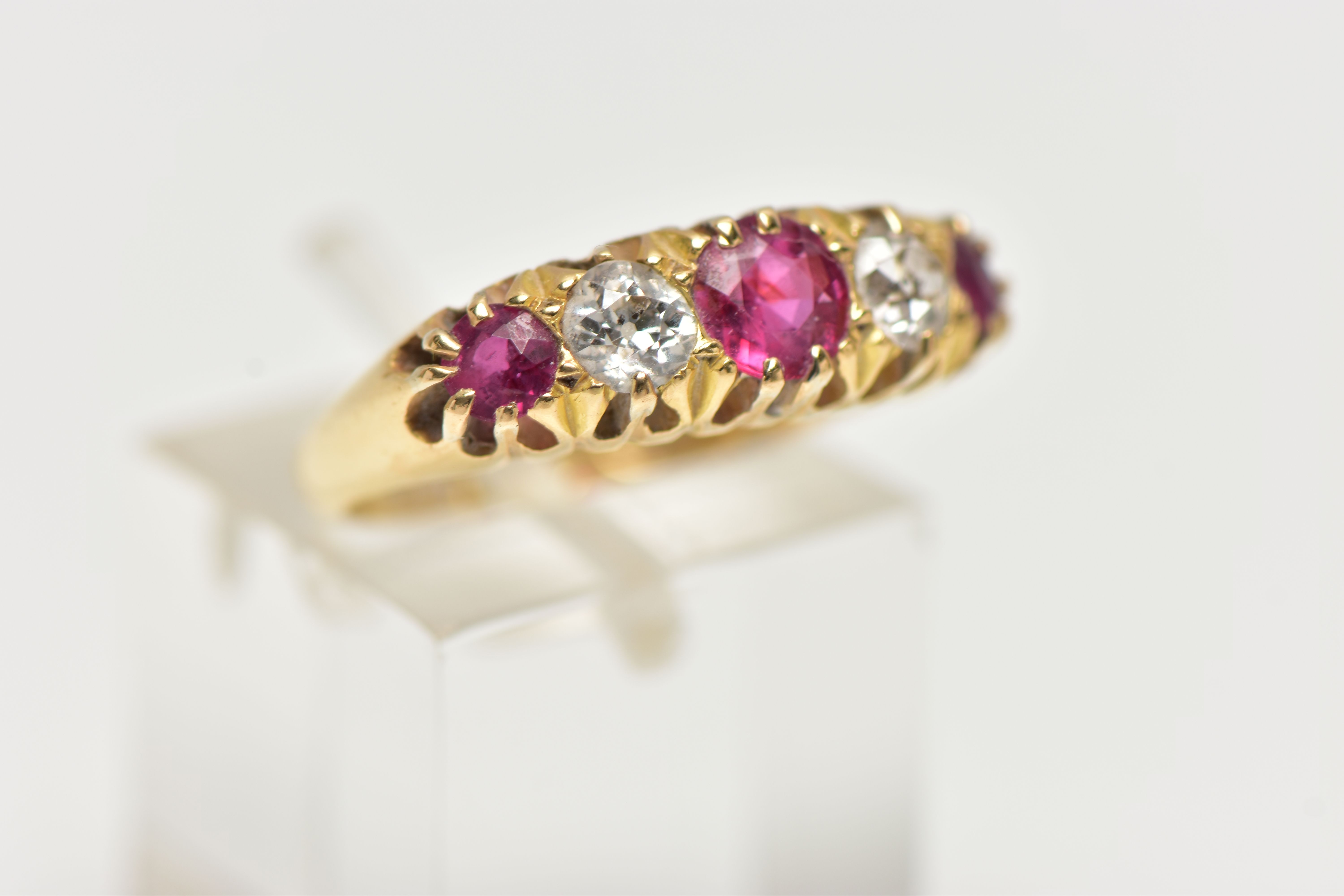 AN EARLY 20TH CENTURY 18CT GOLD, RUBY AND DIAMOND RING, designed with three circular cut rubies, - Image 4 of 5