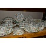 A SIXTY SEVEN PIECE MINTON HADDON HALL PART DINNER SERVICE, comprising a soup tureen, two tureens