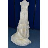 WEDDING GOWN, 'David Tutera' size 6, champagne/gold coloured with white and pewter beaded