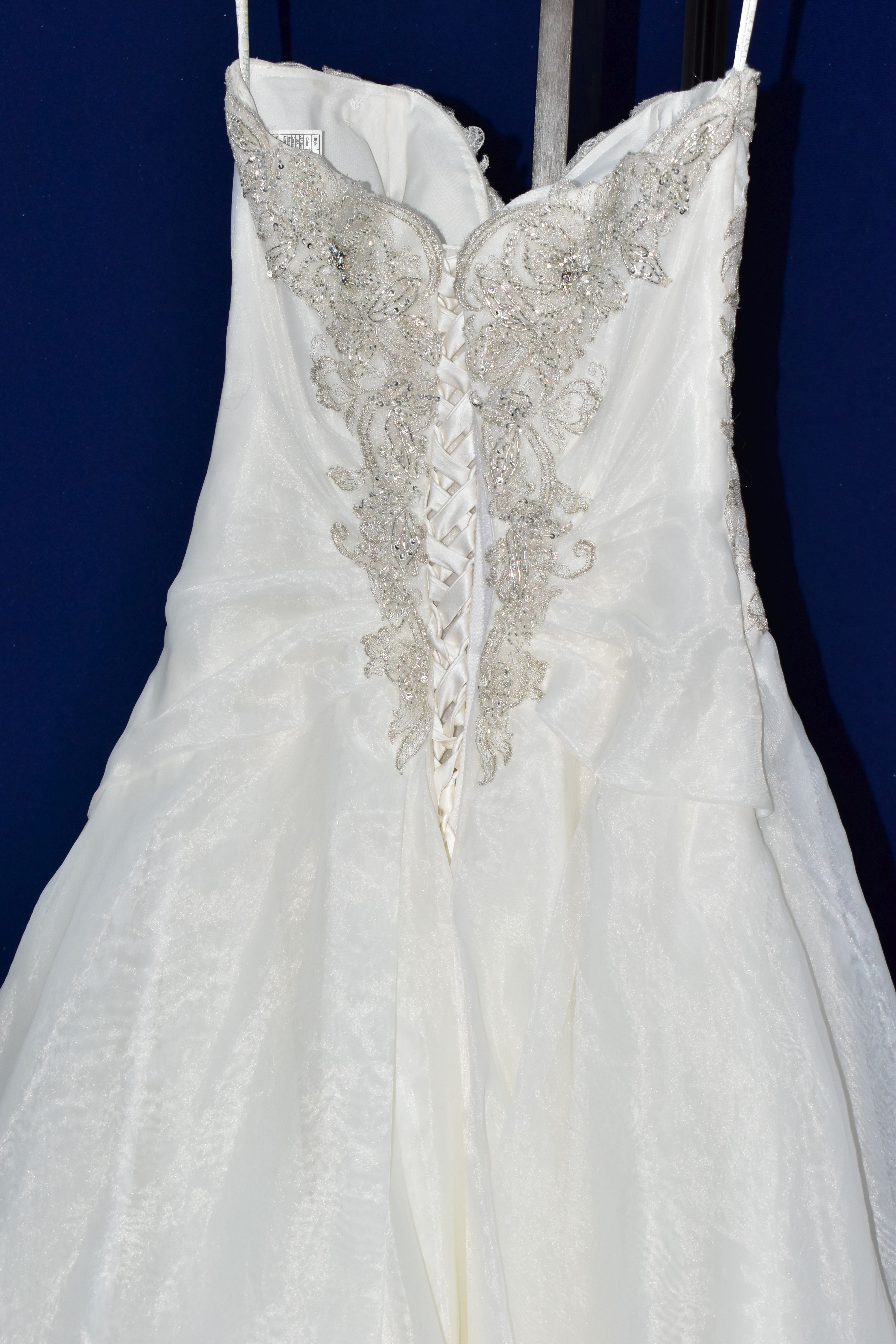 WEDDING DRESS, size 6, long train, pewter accent beaded appliques, strapping detail in the back, - Image 9 of 10