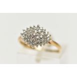 A 9CT YELLOW GOLD, DIAMOND CLUSTER RING, of a marquise shape, set with single cut diamonds,