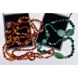 TWO STATEMENT SEMI-PRECIOUS GEMSTONE BEAD NECKLACES, the first a triple row of vari cut carnelian