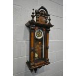 A LATE 19TH CENTURY WALNUT VIENNA WALL CLOCK, with pendulum and pendulum, height 96cm (condition:-