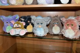 SIX FURBIES TOYS, from the 2000s, by Tiger Electronics, including a Gremlin Furbie and Funky Furbie,