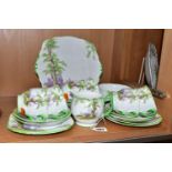 A ROYAL ALBERT 'GREENWOOD TREE' PATTERN TEA SET, comprising a bread and butter plate, milk jug,