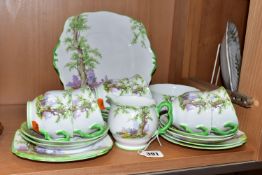 A ROYAL ALBERT 'GREENWOOD TREE' PATTERN TEA SET, comprising a bread and butter plate, milk jug,