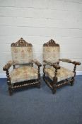 A PAIR OF EARLY 20TH CENTURY ARMCHAIRS, with open foliate surmounts, padded open armrests, on barley