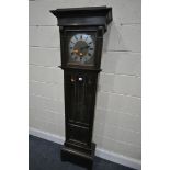 AN EARLY TO MID 20TH CENTURY OAK CHIMING LONGCASE CLOCK, with a brass and silvered dial, and roman