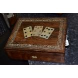 A PLAYING CARD BOX, the hinged lid having three inlaid mother of pearl playing cards inside a