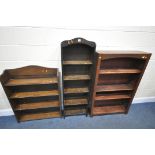 A SLIM OAK OPEN BOOKCASE, 46cm x depth 22cm x height 143cm, a stained pine open bookcase, and