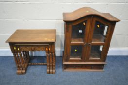 AN OAK NEST OF THREE TABLES, with a single drawer, width 55cm x depth 35cm x height 50cm, and a